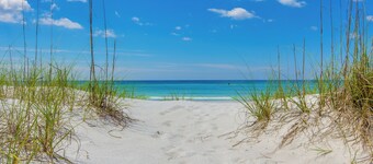 Location Location LOCATION! Steps to Beach w/ PRIVATE Heated Pool!