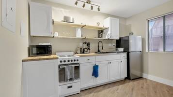 Microwave, stovetop, coffee/tea maker, toaster