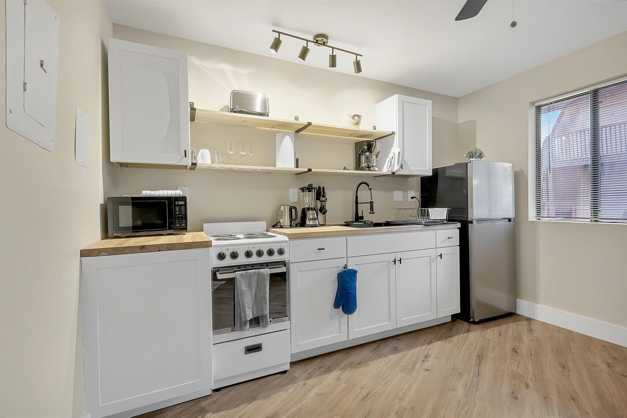 Microwave, stovetop, coffee/tea maker, toaster