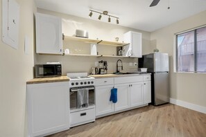 Microwave, stovetop, coffee/tea maker, toaster