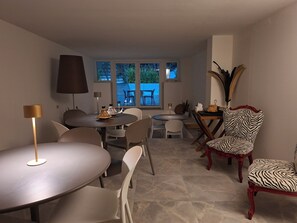 Breakfast, lunch, dinner served; local cuisine 