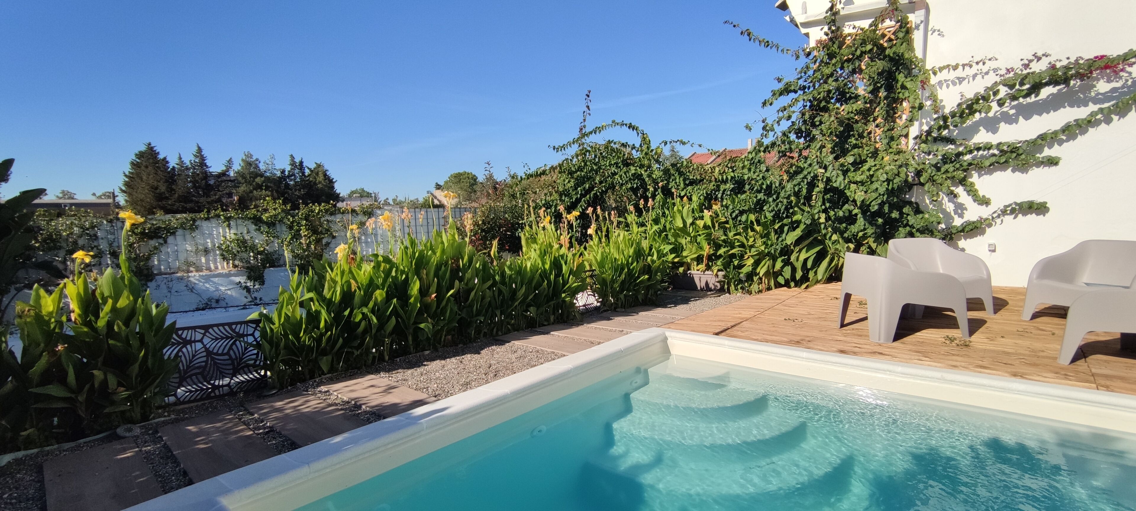 Outdoor pool, open 10:00 AM to 6:00 PM, pool umbrellas, sun loungers