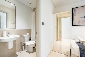 Shower, hair dryer, towels, soap