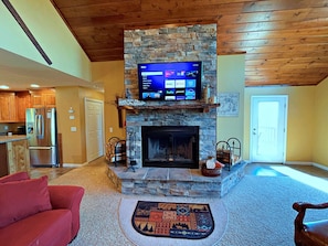Smart TV, fireplace, DVD player, books