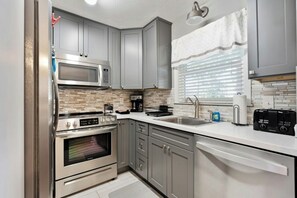 Fridge, microwave, oven, stovetop - Pet Friendly! -76th Ave Townhome B- 2BR/1.5BA (Myrtle Beach)