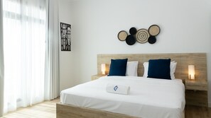 1 bedroom, desk, iron/ironing board, travel cot