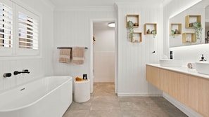 Shower, hair dryer, towels