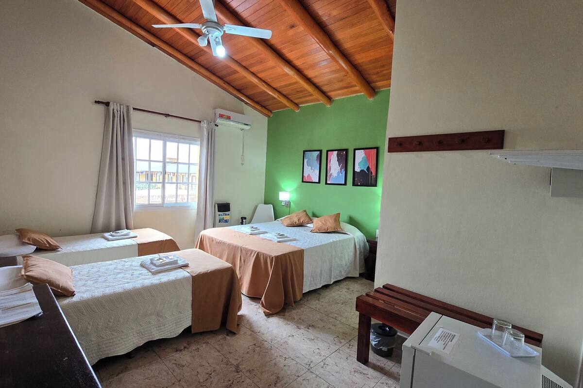 Family Quadruple Room | Minibar, in-room safe, WiFi (free), individually furnished