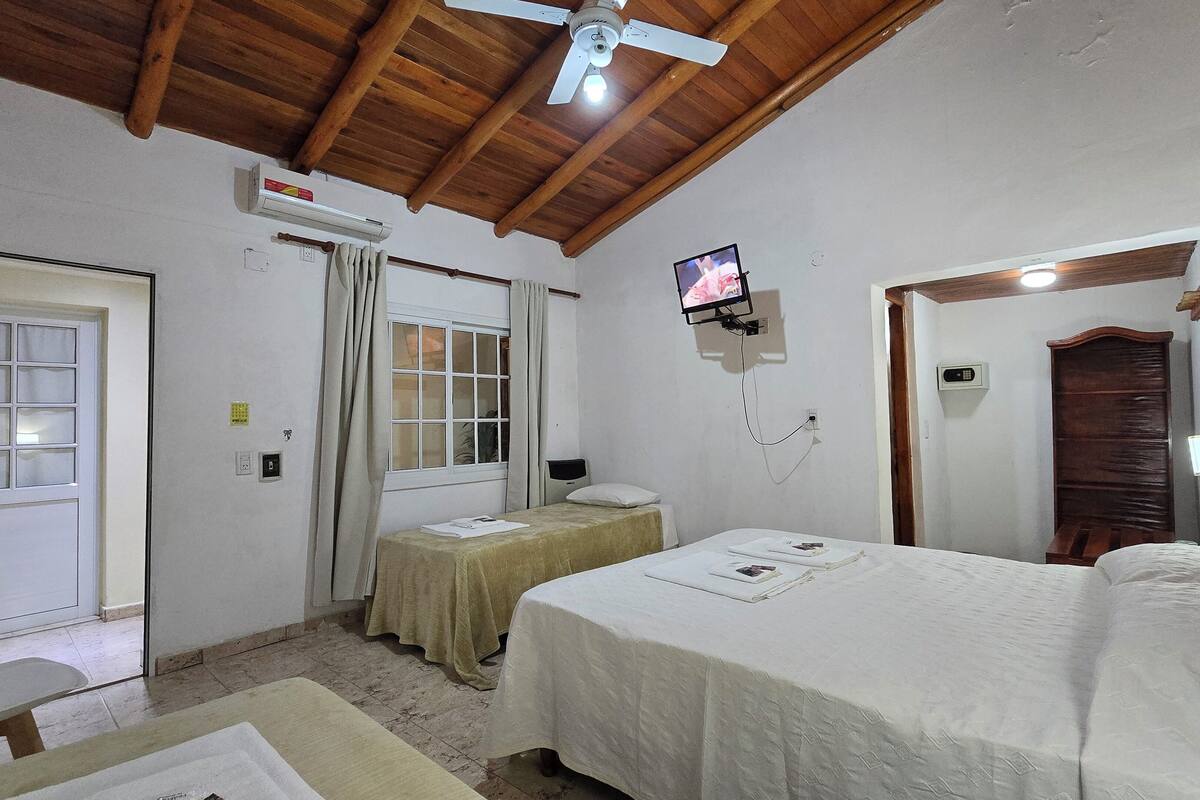 Family Quadruple Room | Minibar, in-room safe, WiFi (free), individually furnished