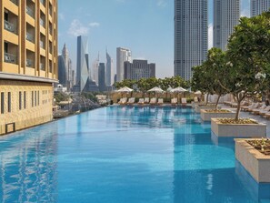 2 outdoor pools, pool umbrellas, sun loungers