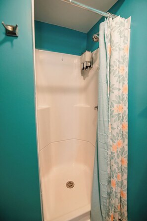 Shower, towels, soap, shampoo