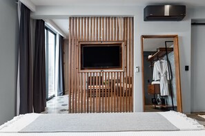 Luxe beddengoed, pillowtop-bedden, een kluis op de kamer