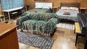 A room with two beds, a desk, a chair, and a small table. - Room with Two DB Beds, Bathroom, Fridge, MW, TV, Wifi - 1 guest 64, 2 guests 120 (Silver Spring)