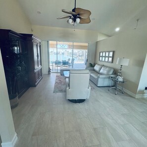 Smart TV, fireplace, books, printers
