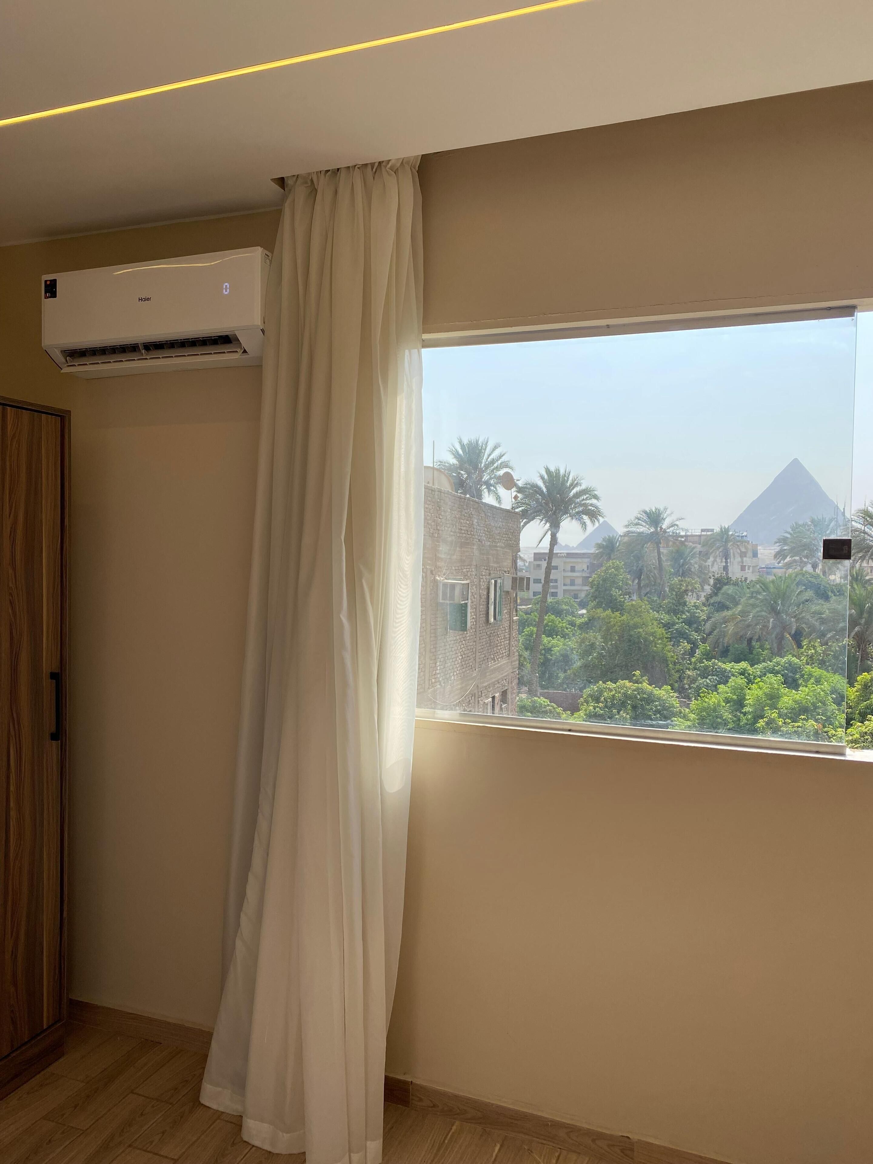 Foto - Night Pyramids Inn Hotel