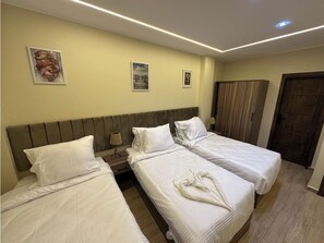Quarto triplo superluxo | 1 quarto, quartos à prova de som, Wi-Fi de cortesia