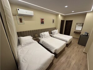 Quarto triplo superluxo | 1 quarto, quartos à prova de som, Wi-Fi de cortesia