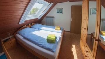 2 chambres, ameublement personnalisé, fer et planche à repasser