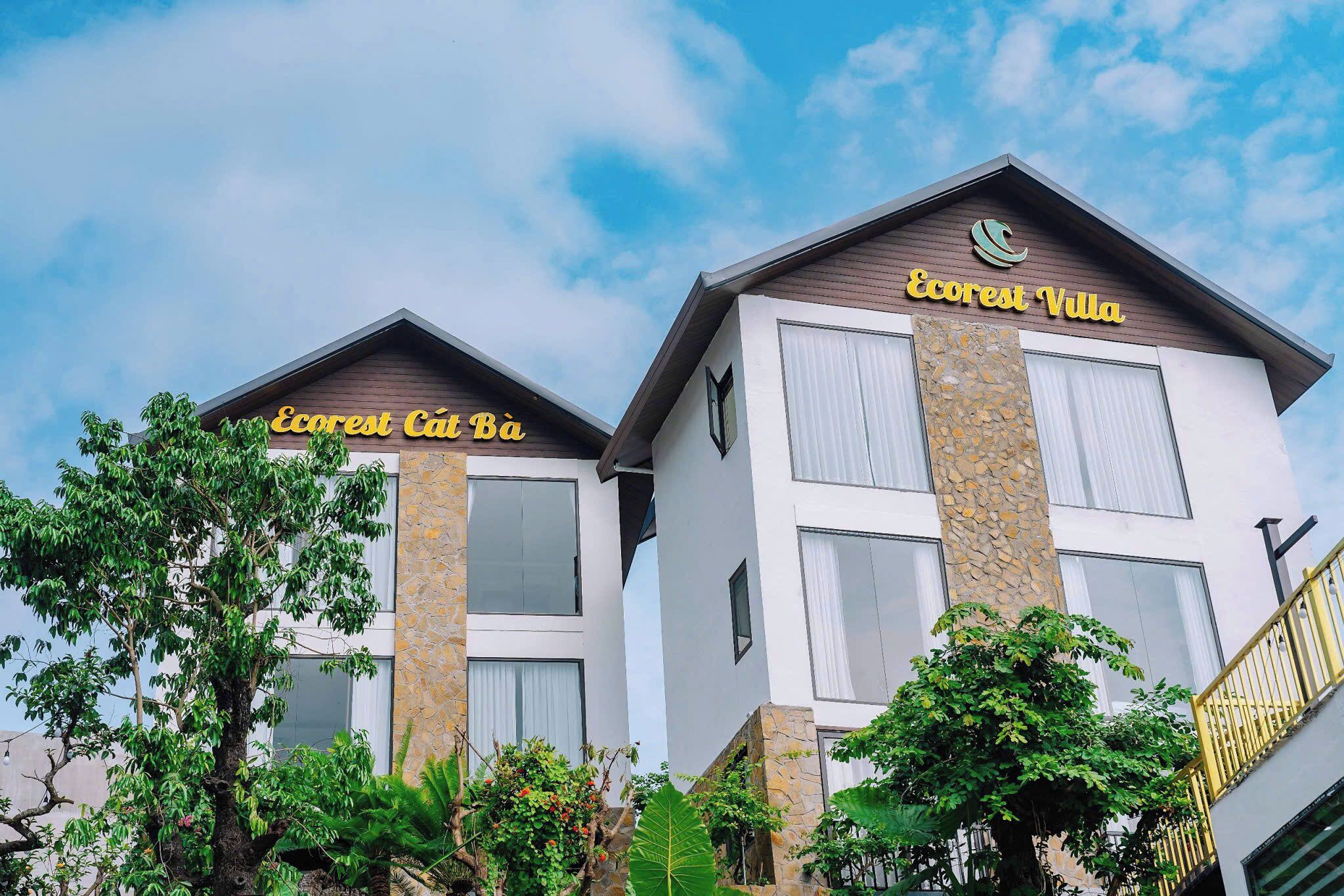 Two buildings with signage reading "Ecorest Cát Bà" and "Ecorest Villa".