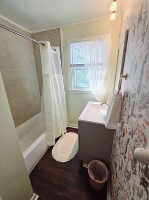 Hair dryer, towels, soap, shampoo