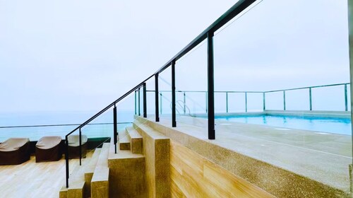 Luxury Oceanfront Suite with Stunning Views, Fully Furnished and Modern