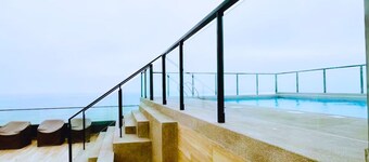 Luxury Oceanfront Suite with Stunning Views, Fully Furnished and Modern