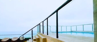 Luxury Oceanfront Suite with Stunning Views, Fully Furnished and Modern