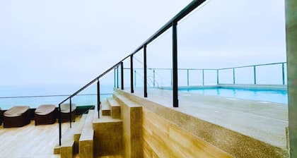 Luxury Oceanfront Suite with Stunning Views, Fully Furnished and Modern