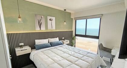 Luxury Oceanfront Suite with Stunning Views, Fully Furnished and Modern