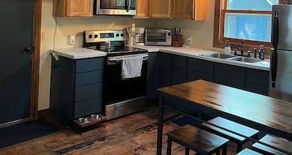 Three bedroom Pet friendly Cottage in the woods Birch Lake. Hiking and biking