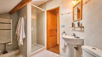 Shower, hair dryer, towels