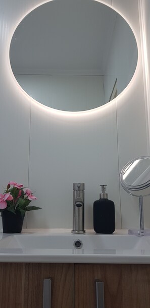 Hair dryer, towels, soap, shampoo