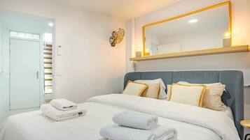 2 dormitorios, tabla de planchar con plancha, wifi gratis y ropa de cama