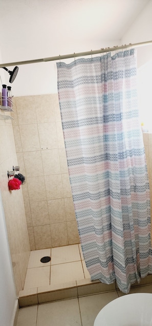 Shower, towels, soap, shampoo