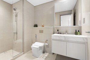 Shower, hair dryer, towels, soap