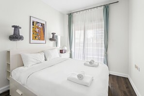 1 habitación, tabla de planchar con plancha, wifi gratis y ropa de cama 