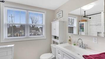 House, Courtyard View | Bathroom | Rainfall showerhead, towels
