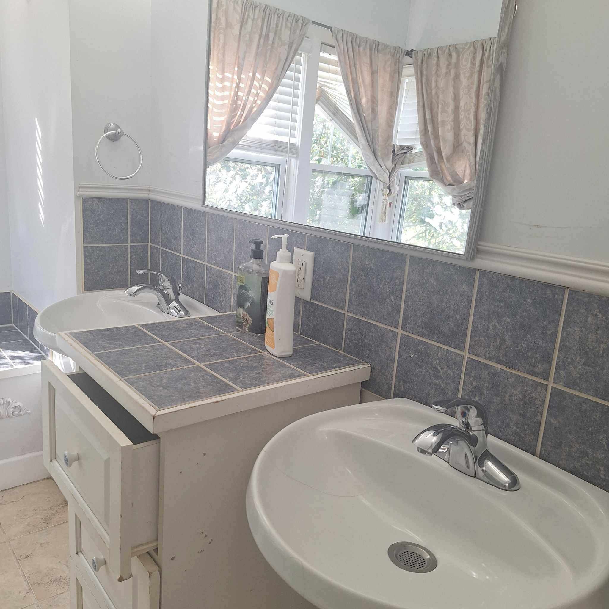 Shower, jetted tub, towels, soap