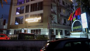 A multi-story building with a prominent sign reading "Beach Resort". - Grand Harmony Beach Resort (Neyyattinkara)