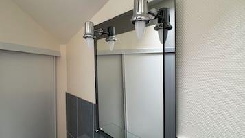 Shower, towels, toilet paper