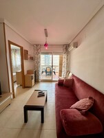 Apartment, 2 Bedrooms, Smoking, Terrace | Living area