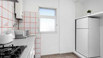 Apartment, 1 Bedroom, Balcony, City View | Laundry