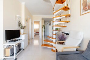 Apartment, 1 Bedroom, Balcony, Garden View | Living area | Books - Golf Park Sunny Cozy Apartment Near Ocean With Double Terraces in Golf del Sur (San Miguel de Abona)