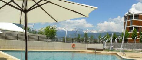 Apartment, 1 Bedroom, Fireplace, City View | Pool | Outdoor pool