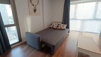 Apartamento, 1 habitación, chimenea, vistas a la ciudad | Sala de estar