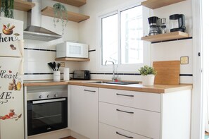 Casa, 2 quartos, varanda, vista para o jardim | Parte interna