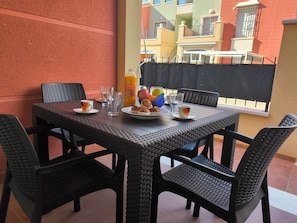 Apartment, 2 Bedrooms, Patio | Dining room - Beach & Pool Av Mancha (Torrevieja)