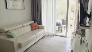 Apartamento, 1 habitación, accesible para personas con discapacidad, fumadores | Zona de estar | Libros