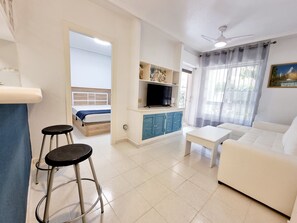 Apartamento, 1 quarto, para fumantes, vista para o jardim | Sala de estar