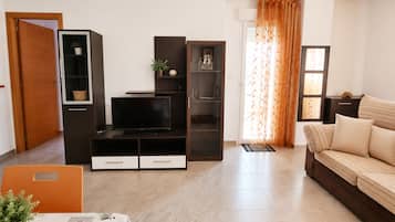 Apartemen, 1 kamar tidur, Boleh Merokok, balkon | Ruang keluarga